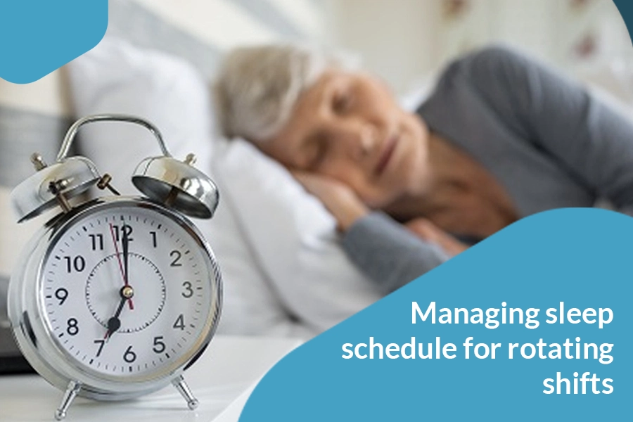 Older woman resting in bed with an alarm clock nearby